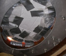 cardboard to provide bottom edge for epoxy fairing